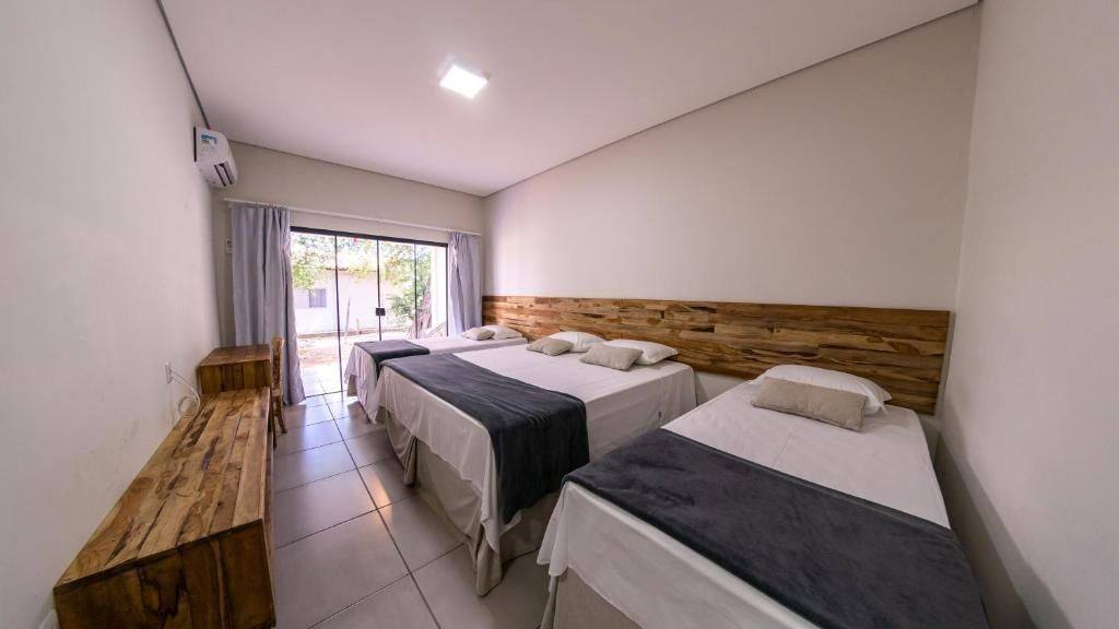 Quarto triplo climatizado