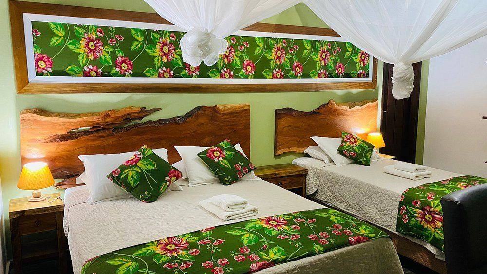 Quarto com mosquiteiro e chita