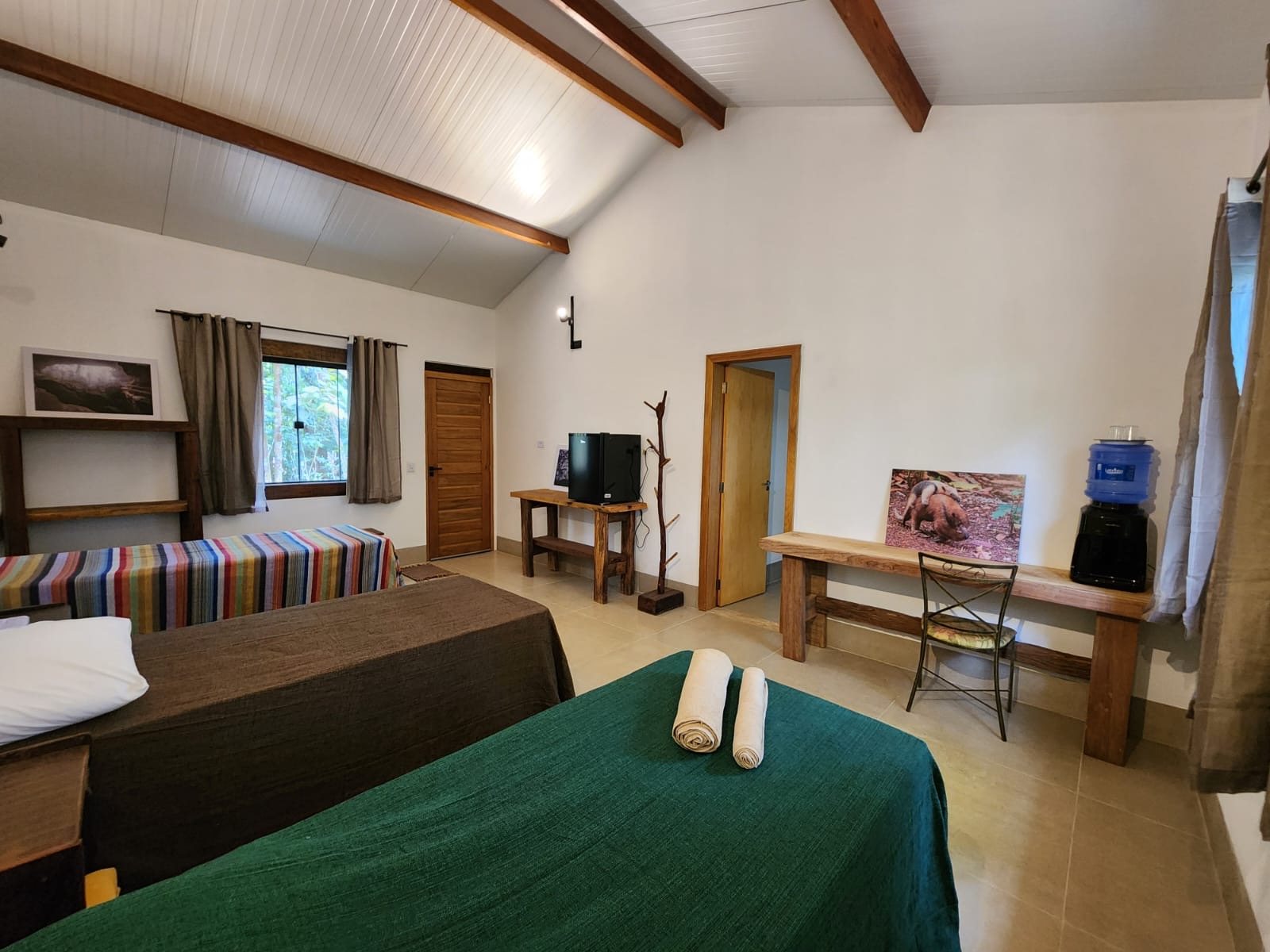 Cabana com frigobar e água mineral